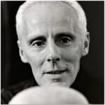 Poemas: História de cão / voz numa pedra / A 10.000 metros — Ver-O-Poema